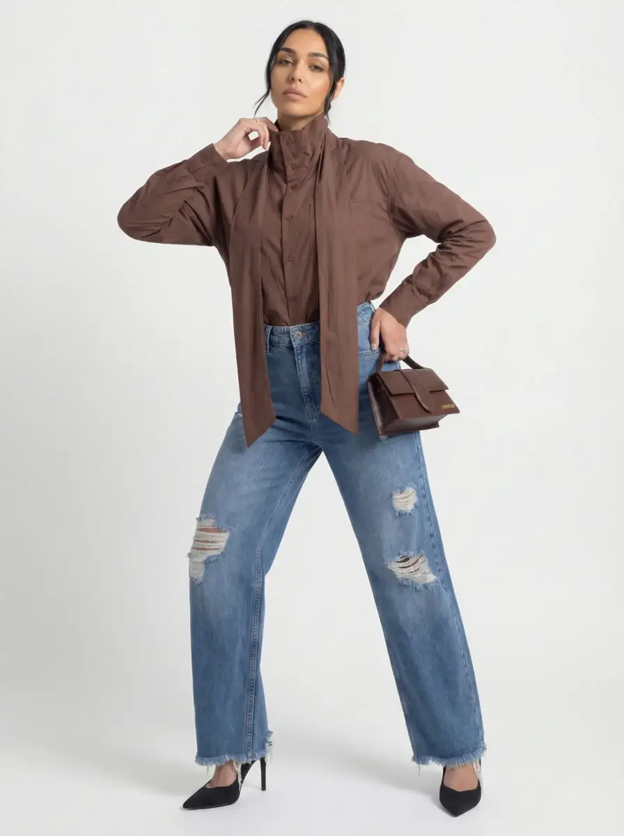 جينز واسع ممزق